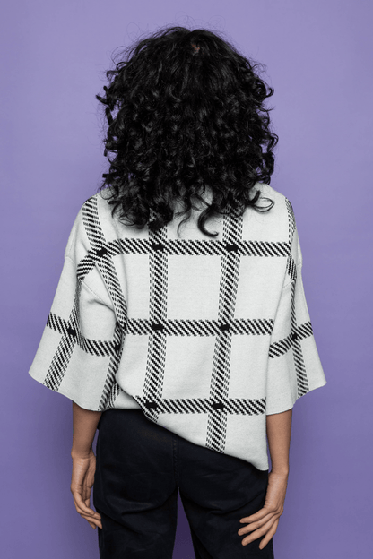 This is The Remix High Neck Jumper IT'S TIME TO CHANGE - High Neck Checked Jumper (Soft Grey).