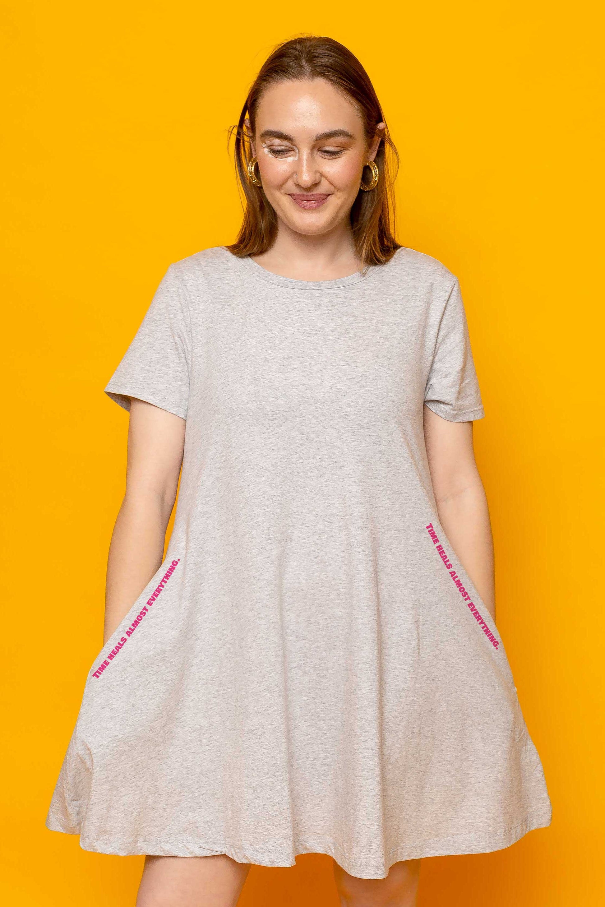 This is The Remix Dress TIME HEALS ALMOST EVERYTHING - Swing T-Shirt Dress With Pockets In Grey