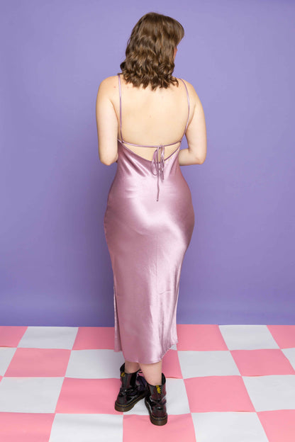 This is The Remix Dress WHAT DO WE LIVE FOR? - Satin Lace Up Slip Dress in Lilac Pink